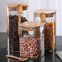 Glass storage bottle with bamboo lid